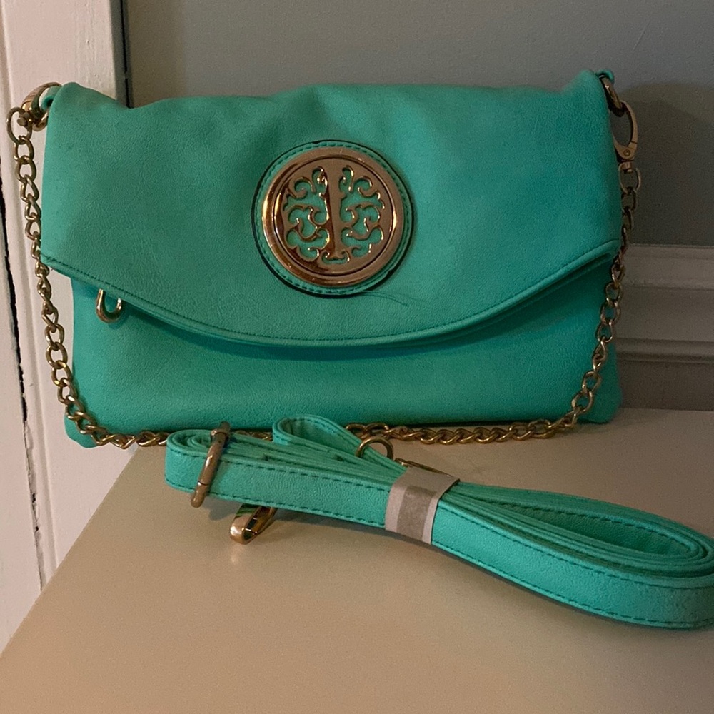 Mint green clutch with long strap